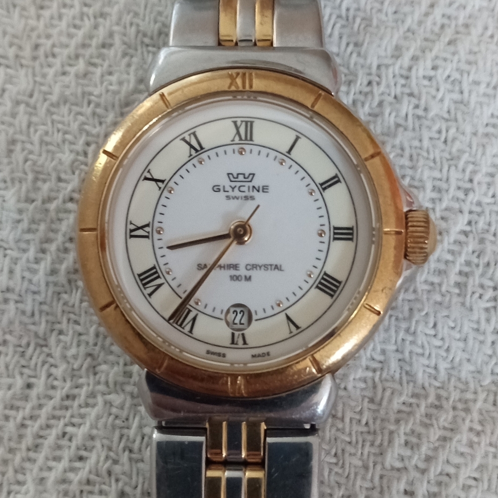 Women's Gold and Silver Watch